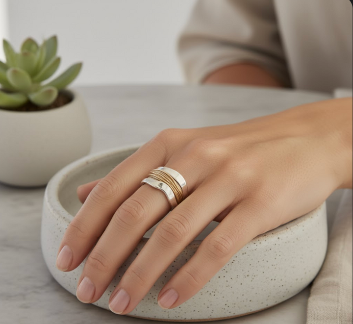 Silver ring with golden threads